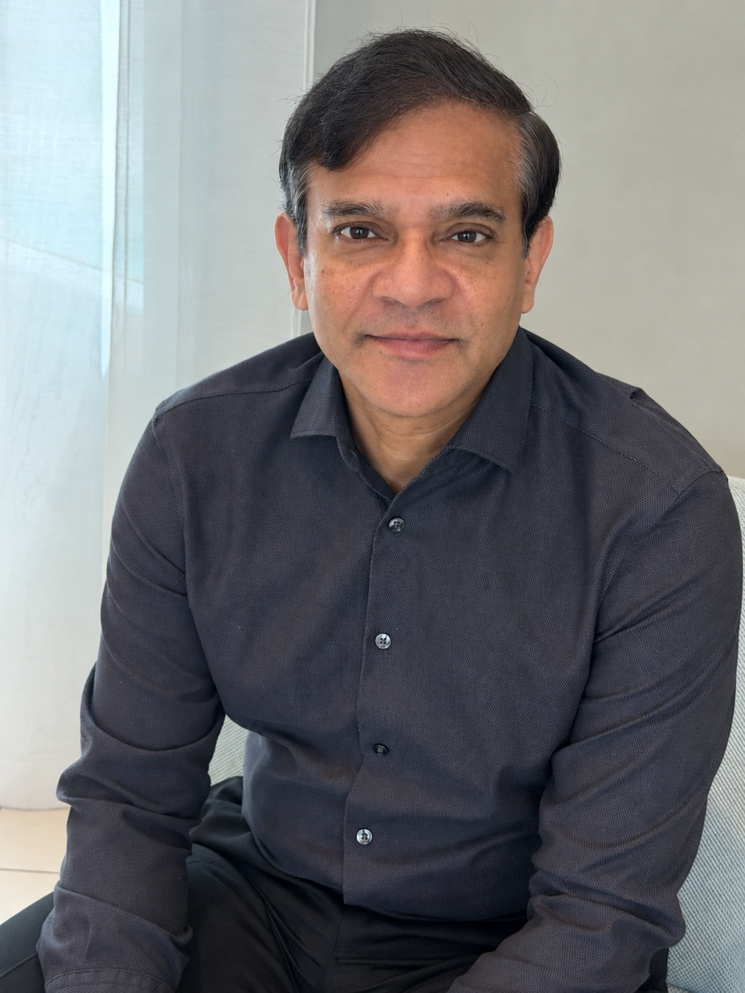 Seated portrait of Anurag Gupta